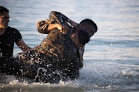 a group of marines in the water
